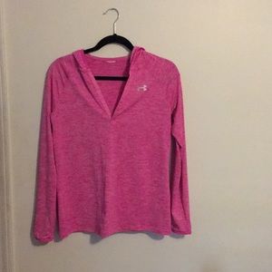 Woman hooded under armor jacket